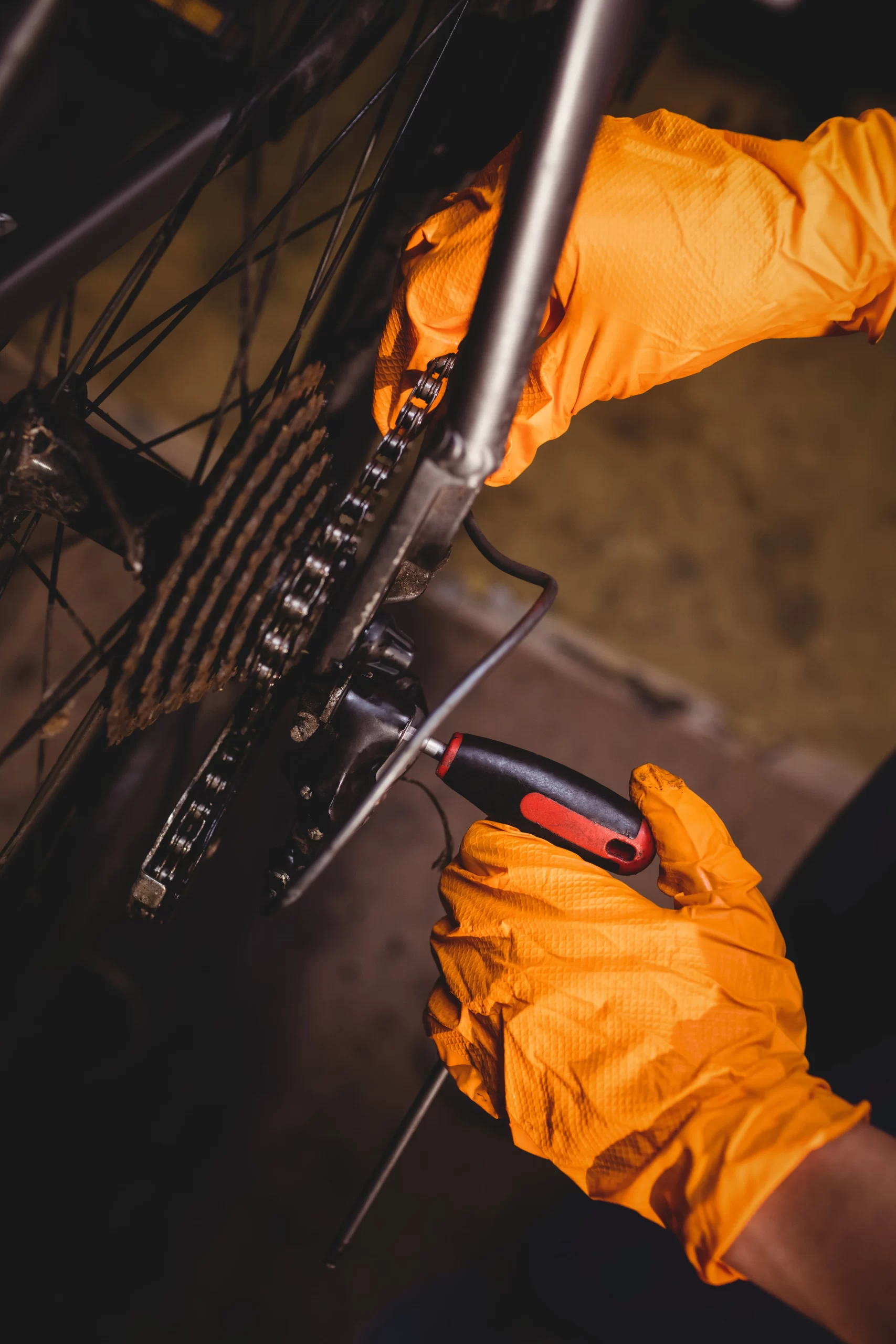 mechanic-repairing-bicycle-min